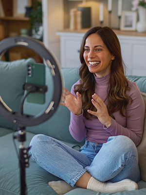 woman making a video of herself