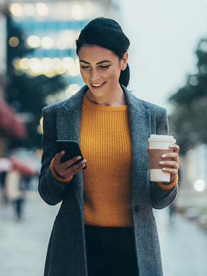 woman looking at her phone