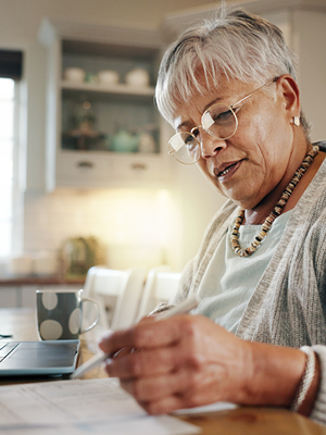 Woman paying bills