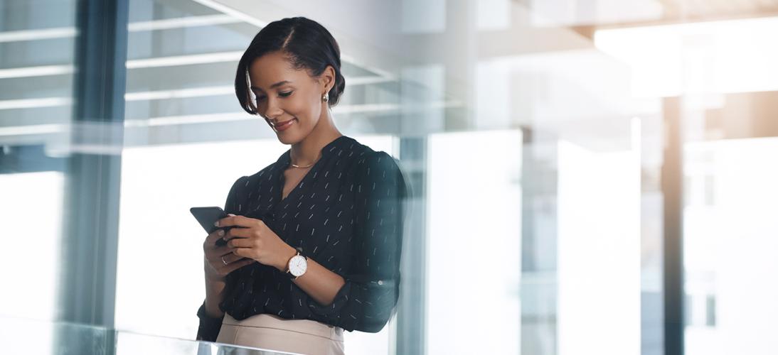 woman looking at a smartphone
