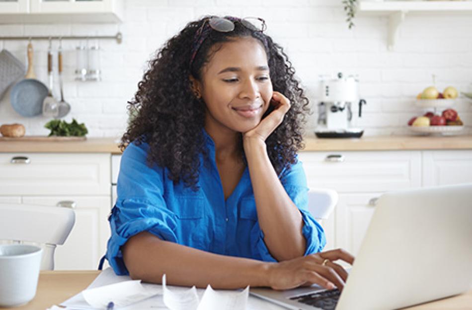 woman looking at computer