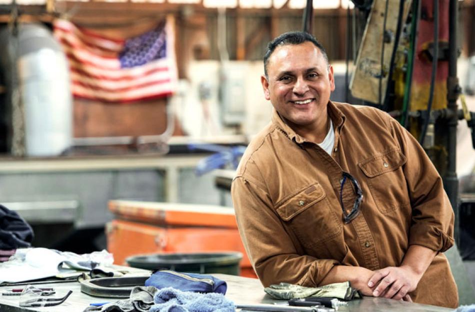 man smiling in a shop