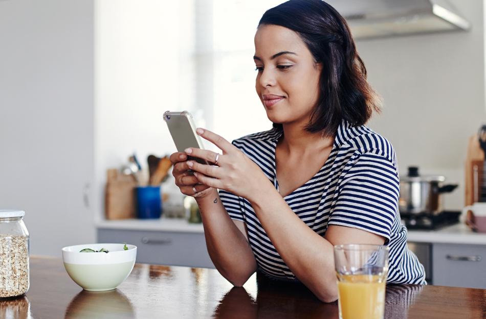 woman looking at her phone