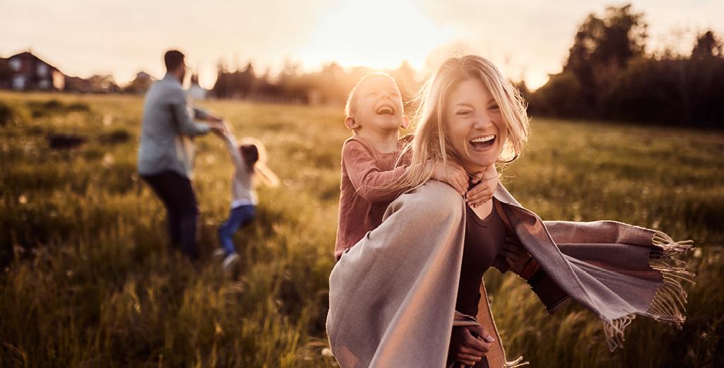 family running in a field